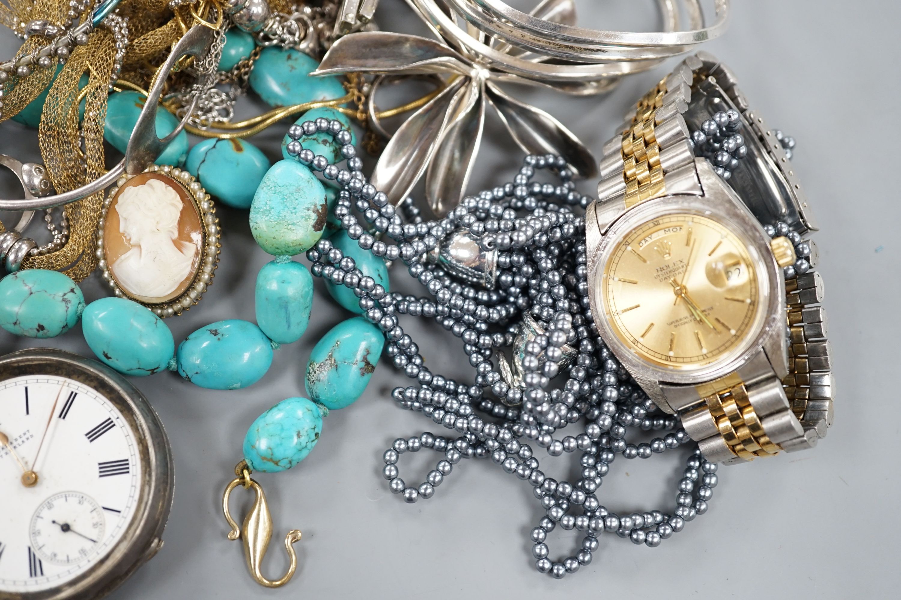 A small quantity of assorted costume jewellery, two silver pocket watches and assorted wrist watches including Timex.
